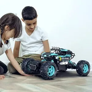 CROBOLL 1/12 Scale Electric RC Monster Truck 4x4 with Lifting Function Large Remote Control Car for Kids Boys 2 4GHz All Terrain Off Road Rock Crawler Toy Gift Includes 2 Batteries Cyan